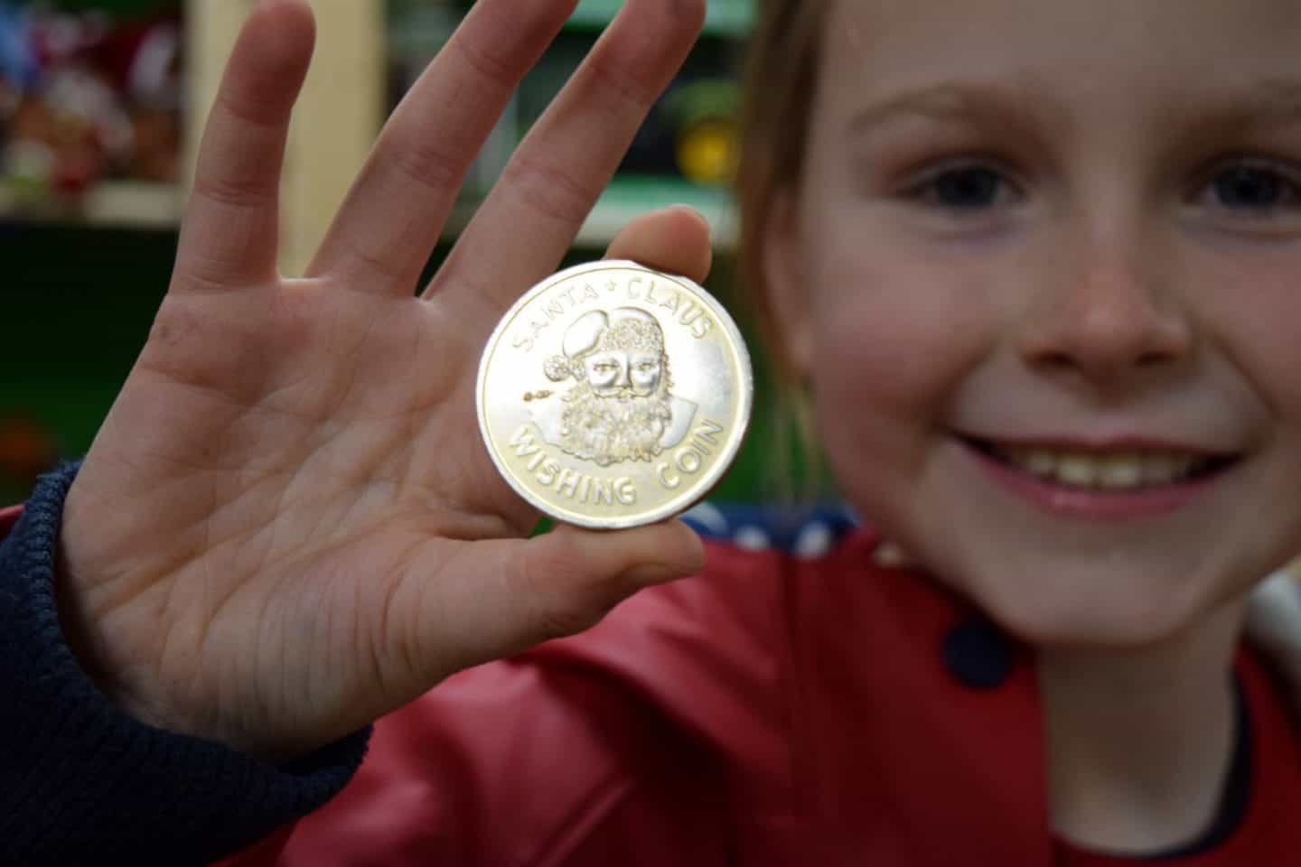 A special gold coin to spend in Santa's toy shop