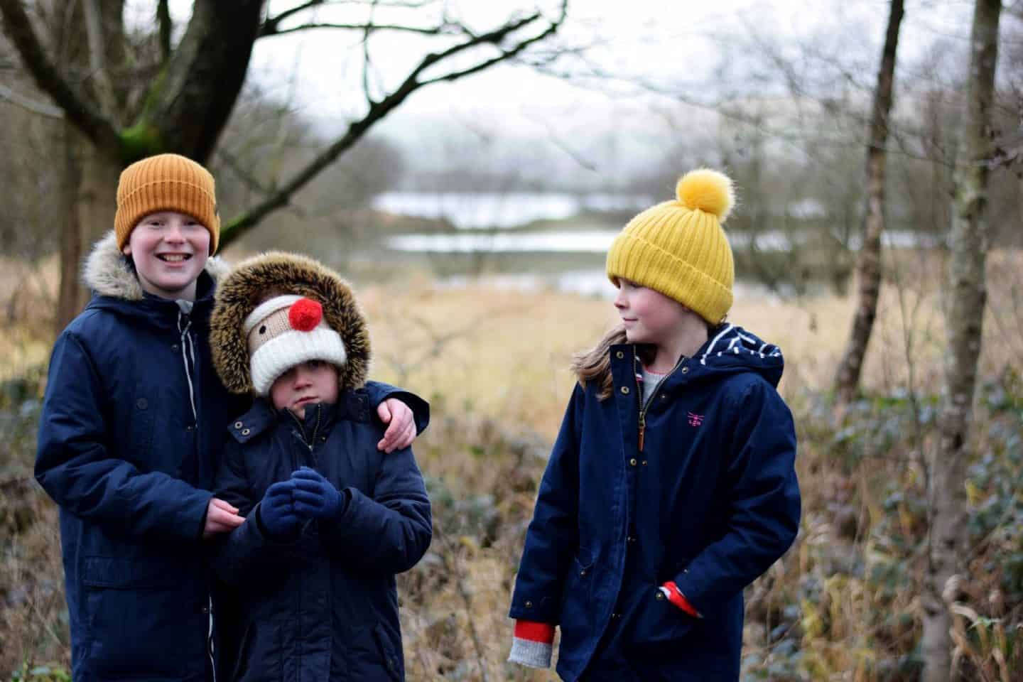 Siblings on a winter walk around Hollingworth Lake