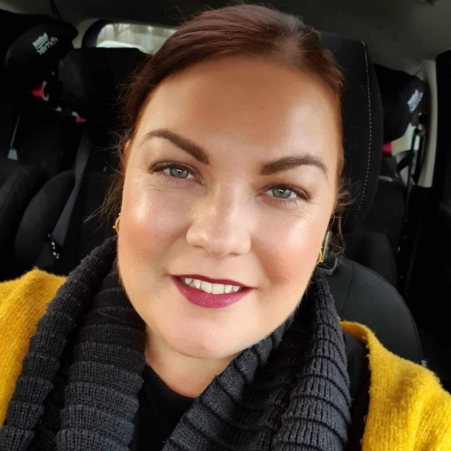 Showing of my lovely white teeth after whitening treatment