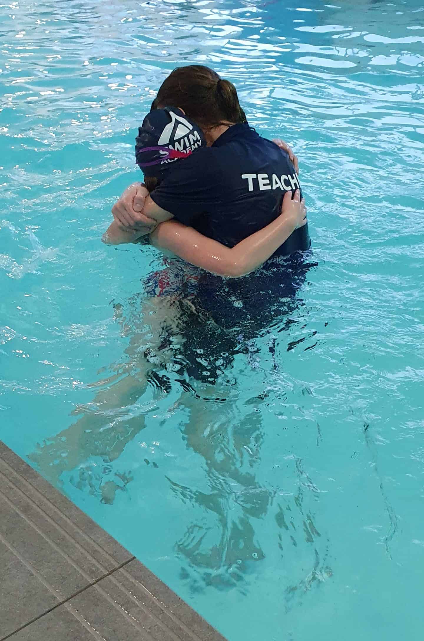 Amy & Claire celebrating her 10 metres badge.