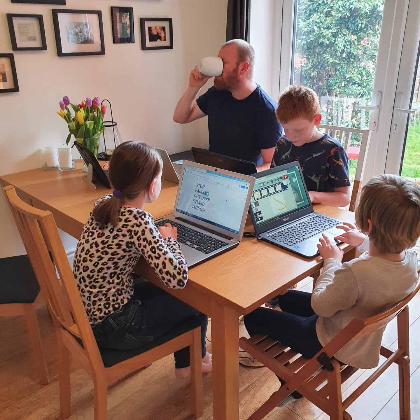 Children doing school work at home