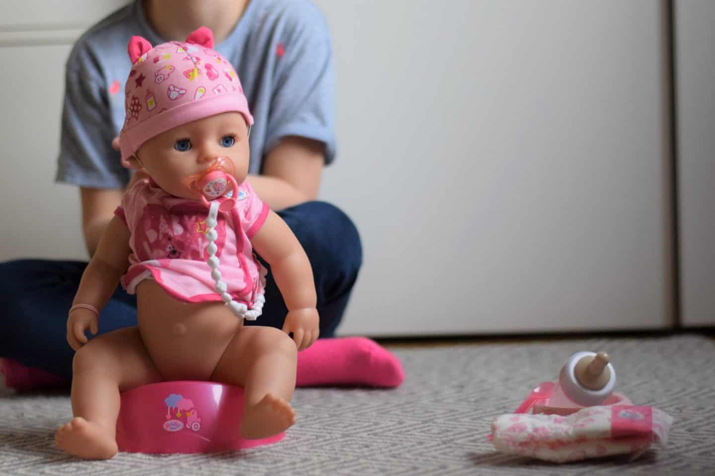 Doll on a toy potty - doll has wee function