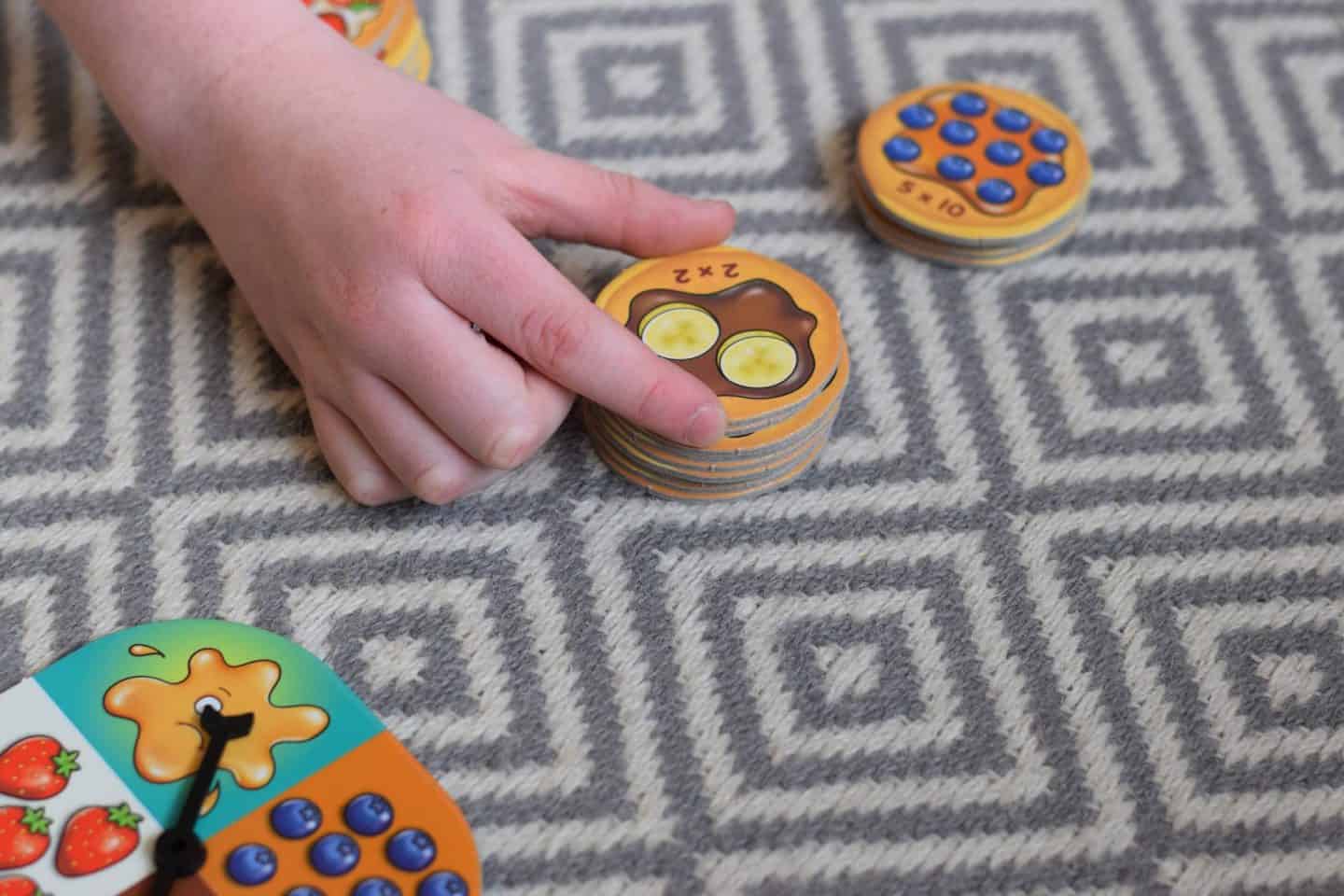 Take a pancake from the pile and solve the multiplication calculation.