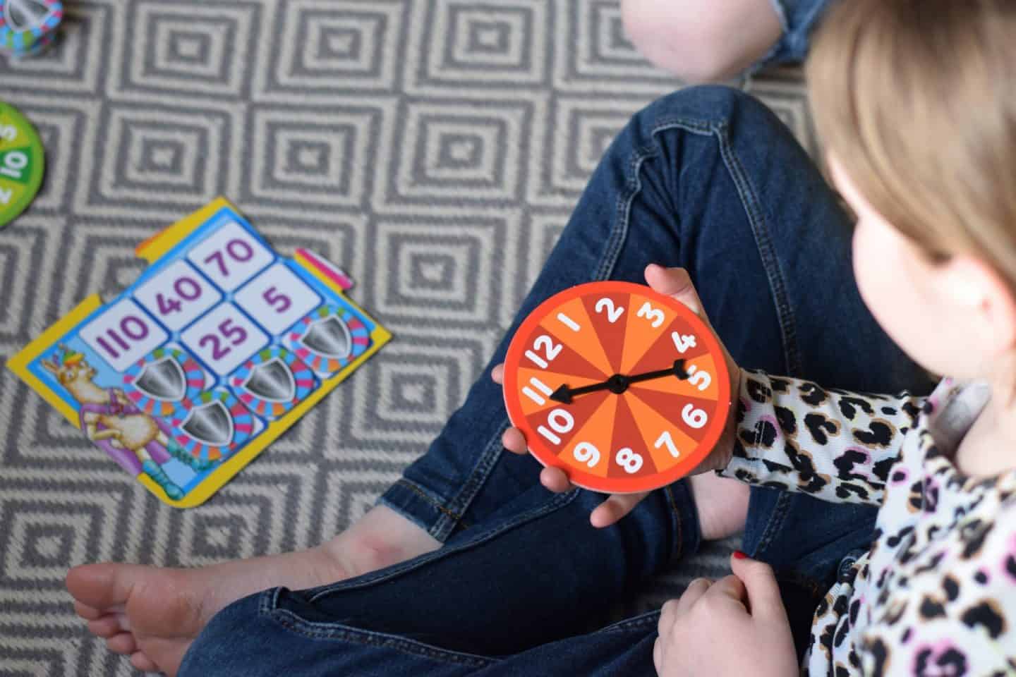 Spin the red and green spinner to create a times table question