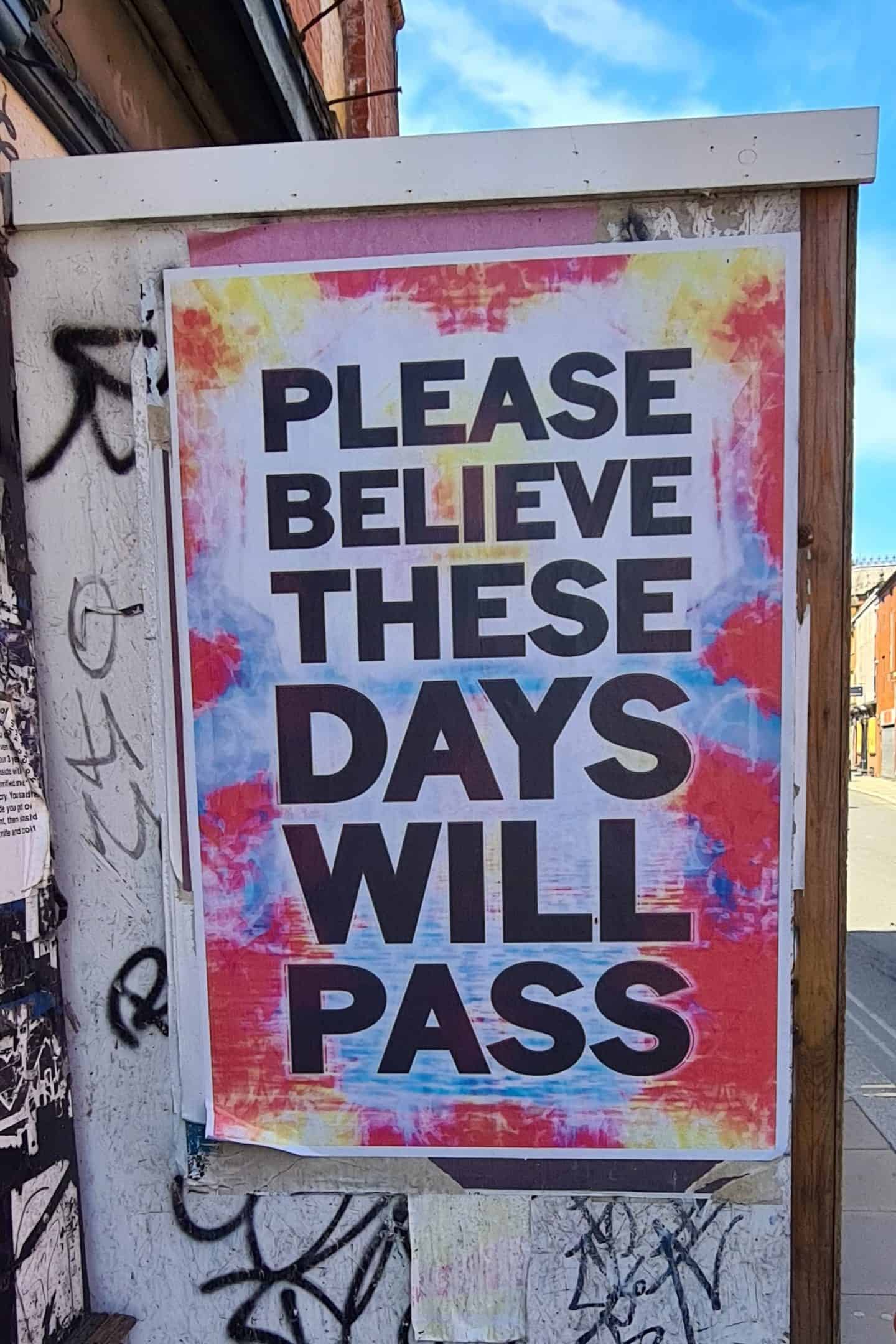 Please Believe These Days Will Pass poster in the Northern Quarter