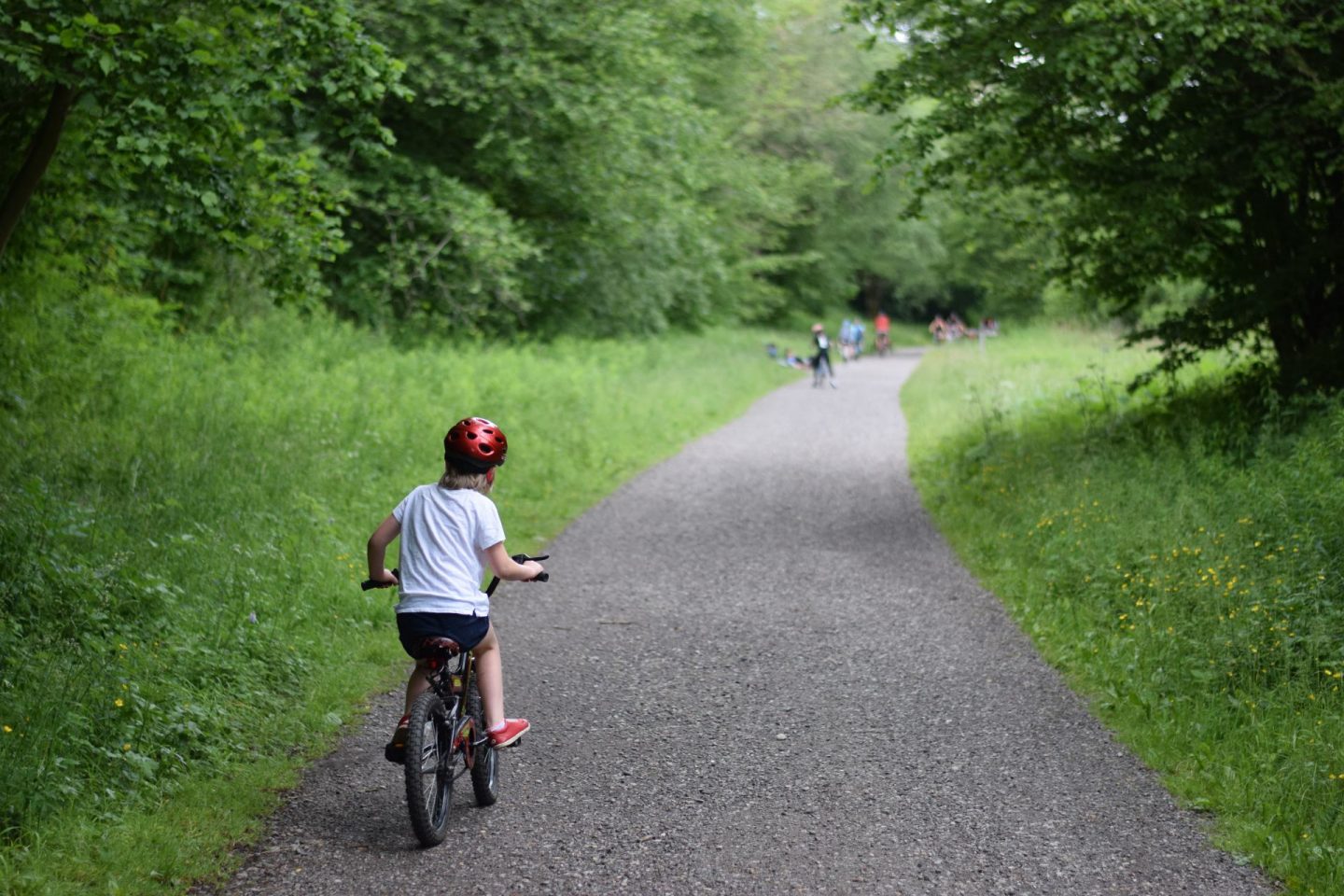 Little girl riding her bike on the Monsal Trail
