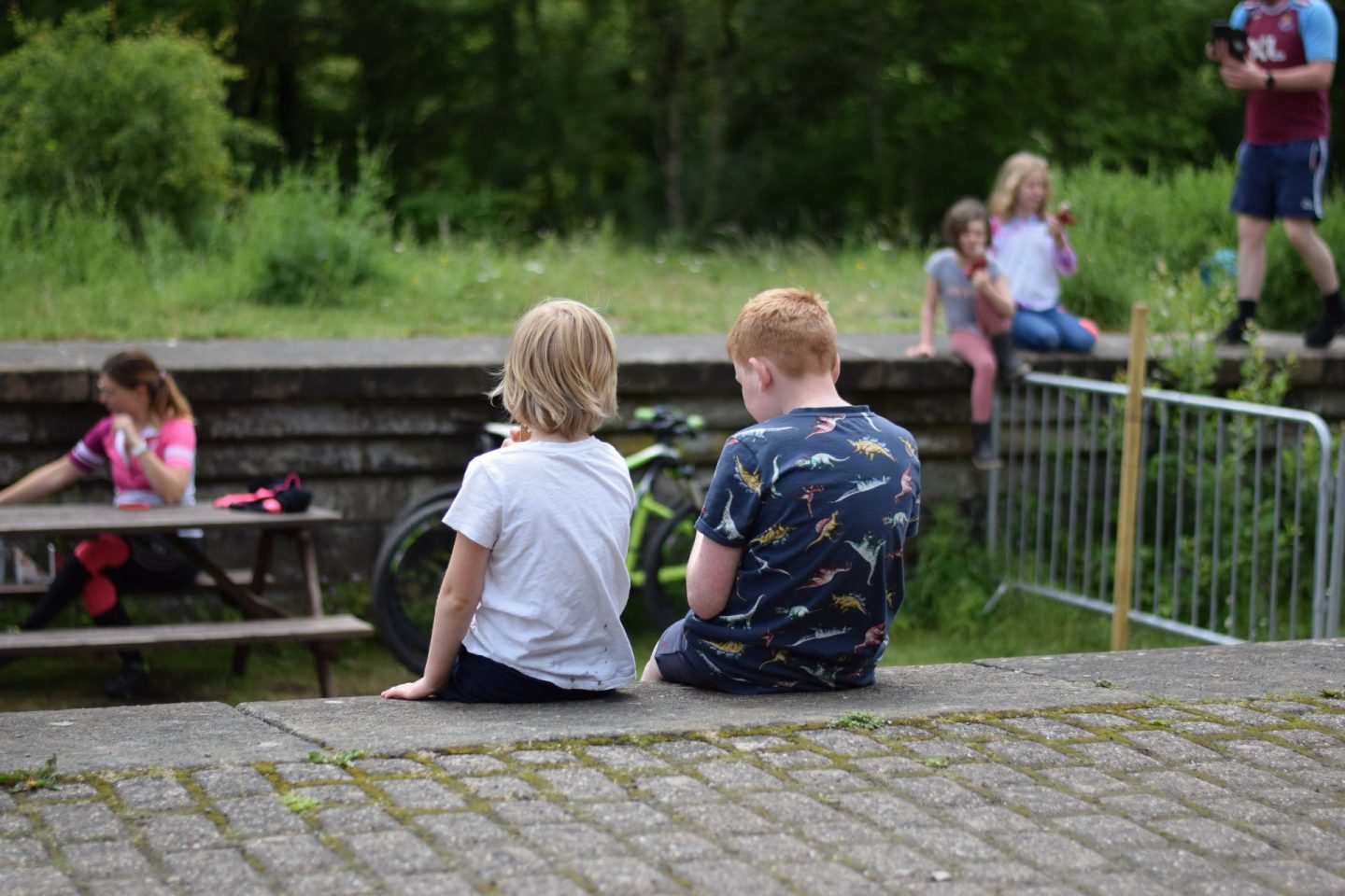 Kids sitting eating ice cream at Miller's Dale Station
