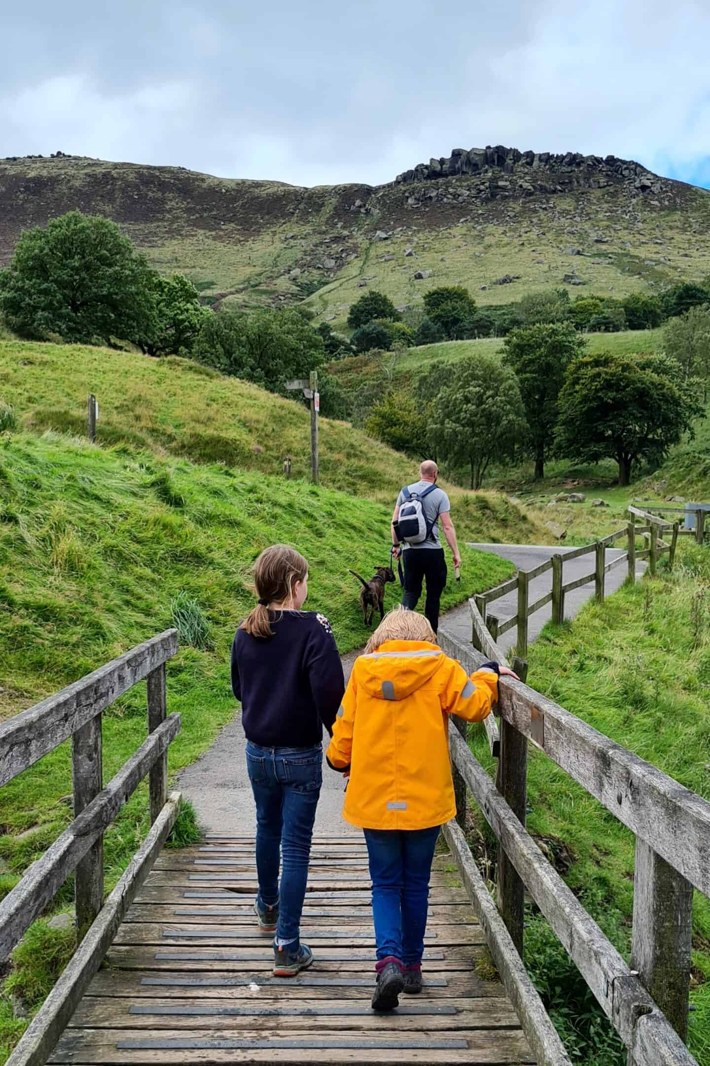 Children and dog walk - exploring Dove Stone reservoir near Oldham