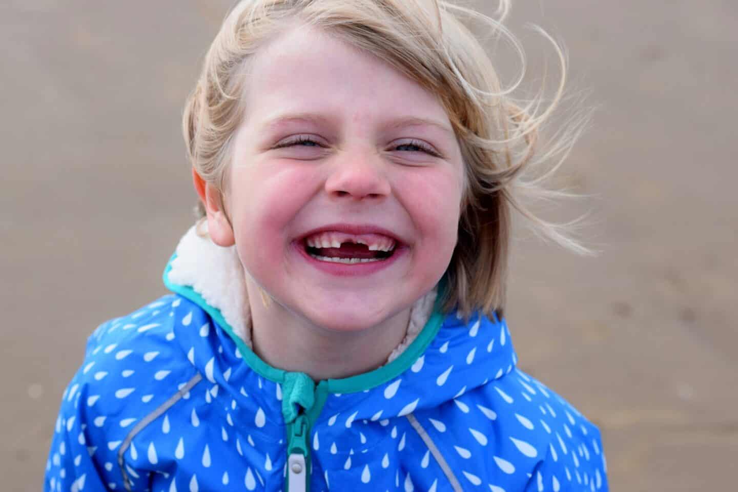 Amy smiling and showing off her double tooth gap