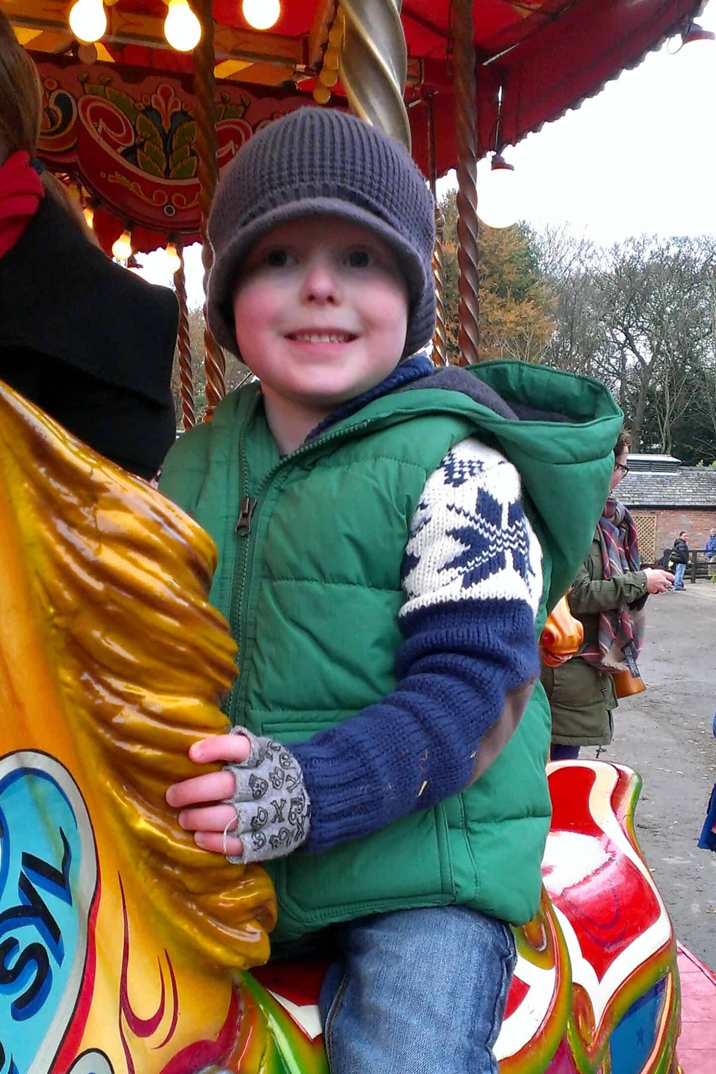 Riding the merry go round at Tatton Park