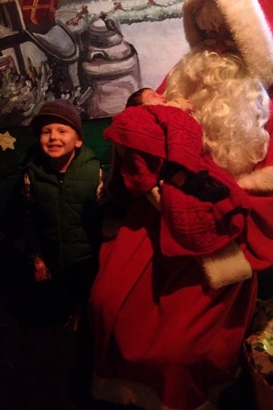 Father Christmas at Tatton Park - newborn baby sleeping through her first photo with Santa!