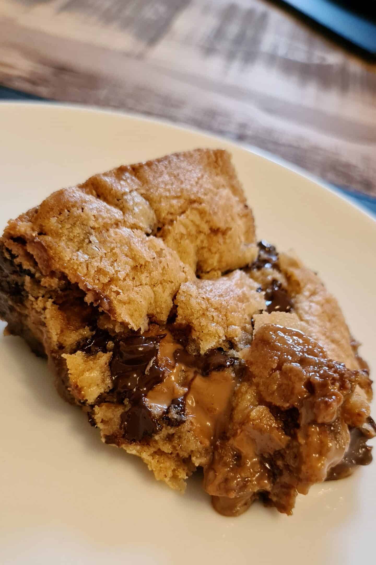 Warm Biscoff Cookie pie with chocolate chips and Biscoff spread oozing from the middle