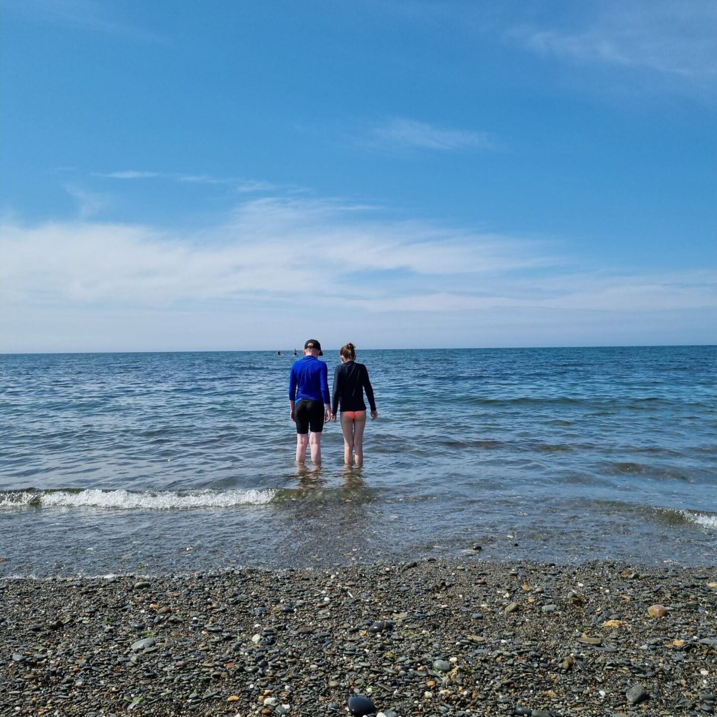 Paddling on in the sea at Aberystwyth South Beach