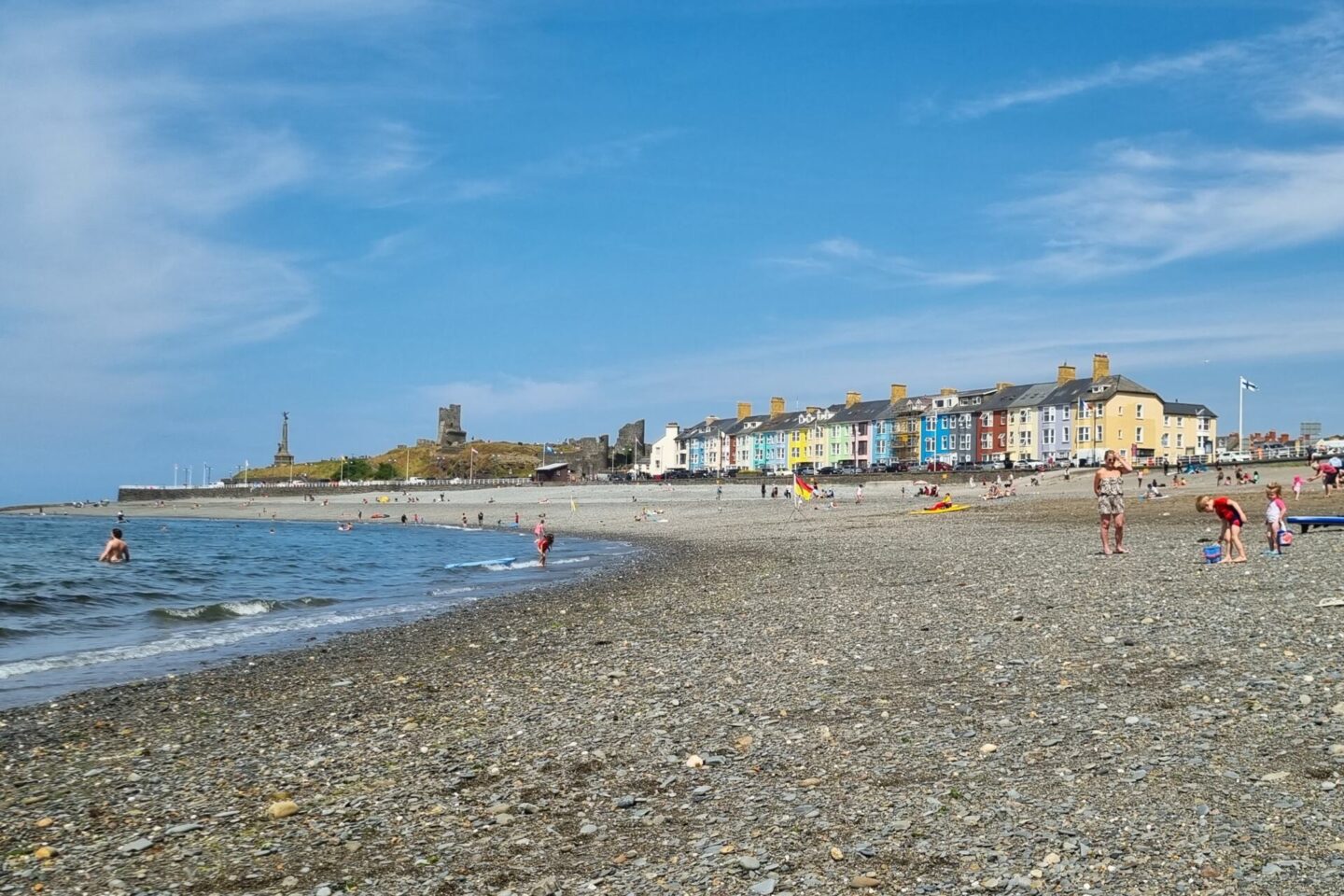 South beach, Aberystwyth - pretty pastel coloured houses and a pebble beach