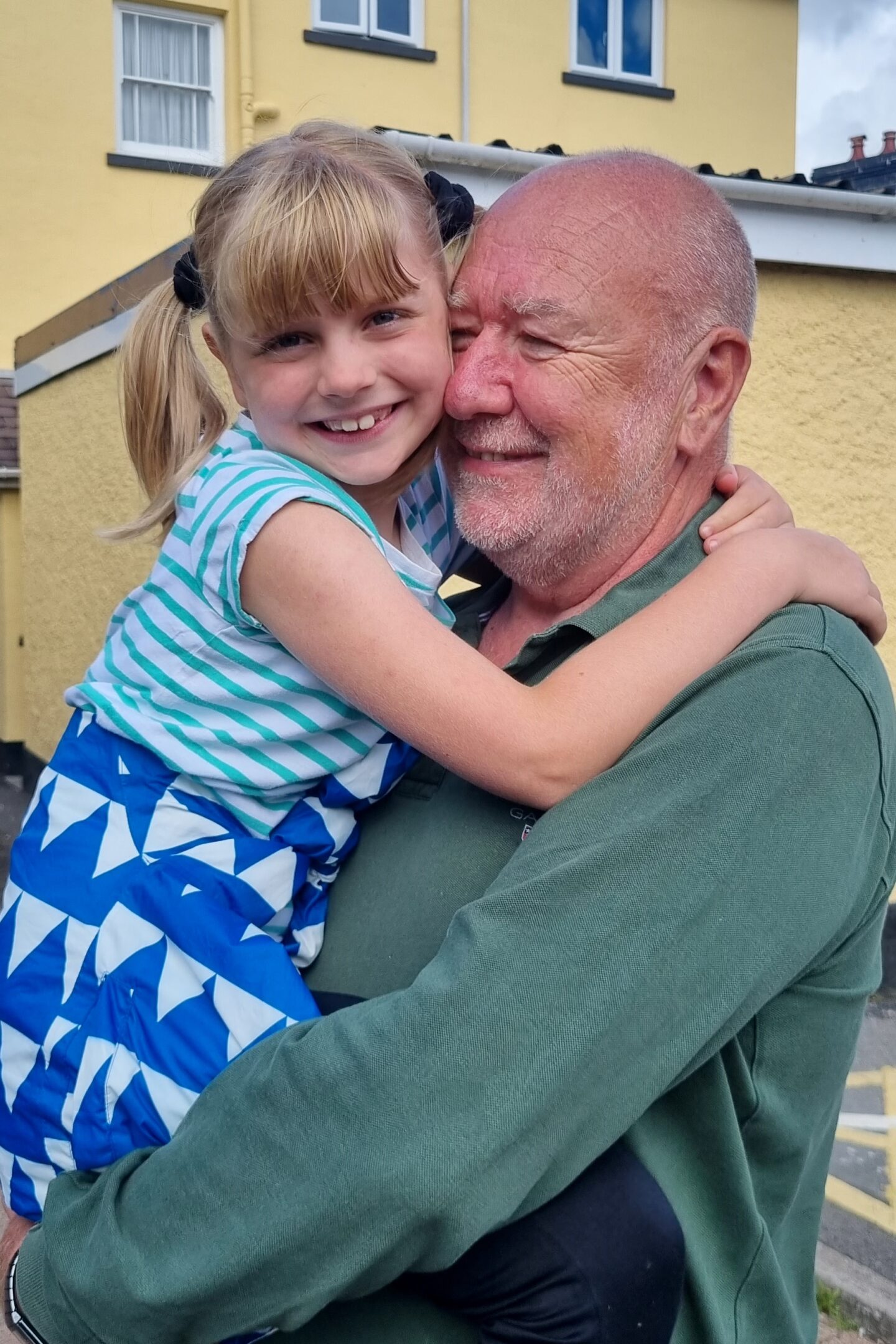 Having a cuddle with Grandad in Llandeilo