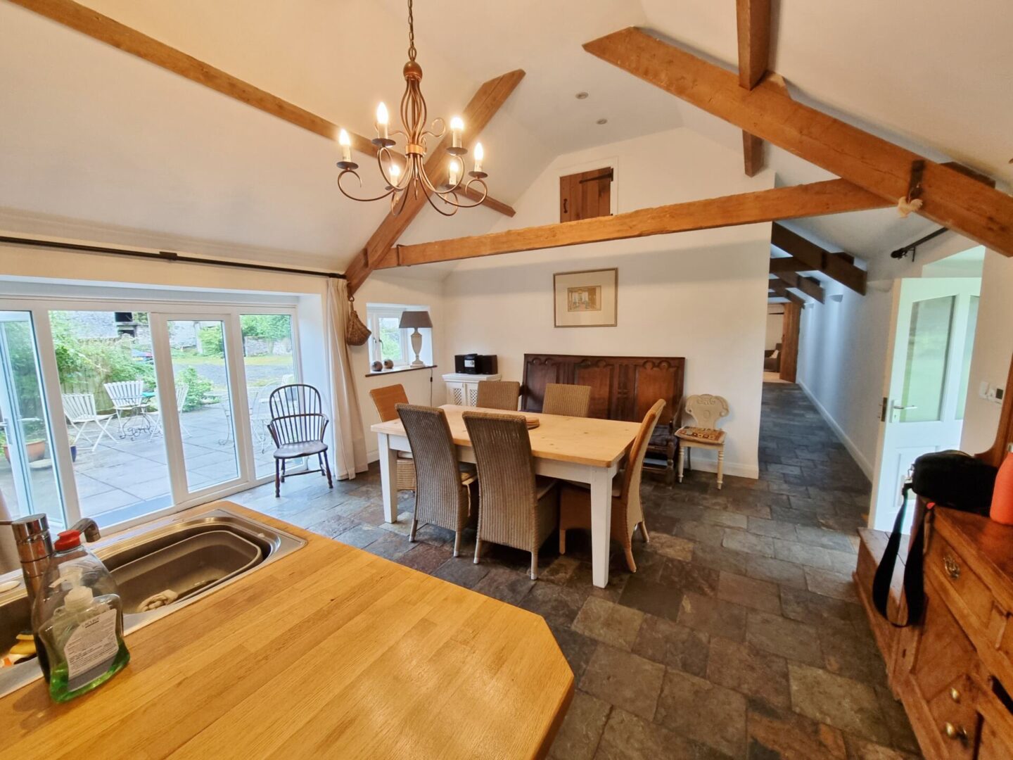 kitchen dining area with vaulted ceilings