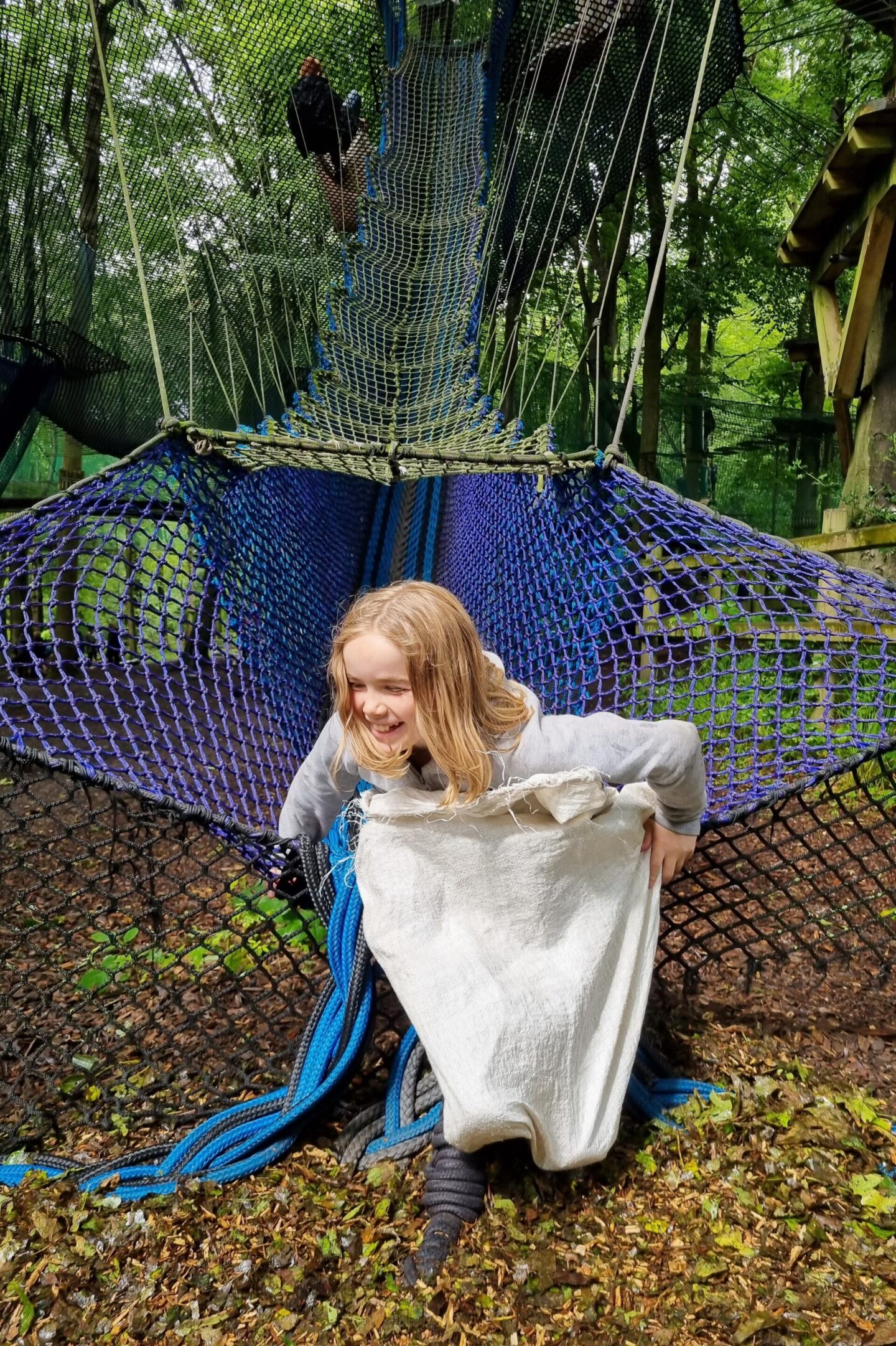 Rope tunnels slides at treetop nets in Heaton Park