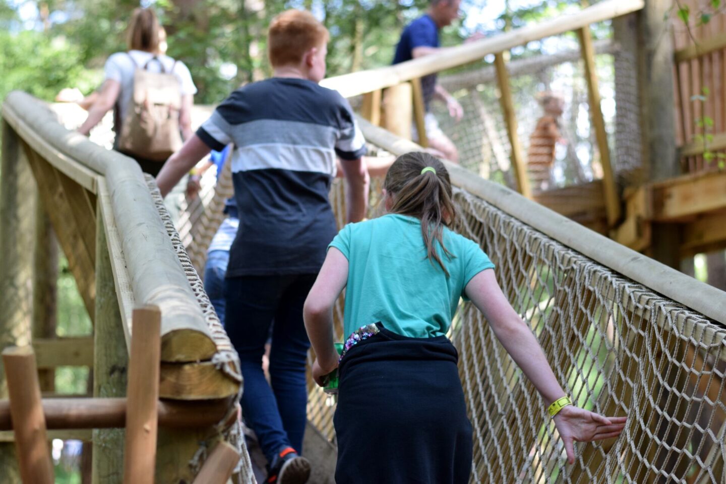 Climbing the rope bridge slopes in the maze