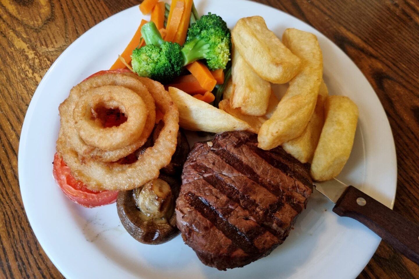 Steak, chips and onion rings at The Black Ladd - a dog friendly pub near Manchester