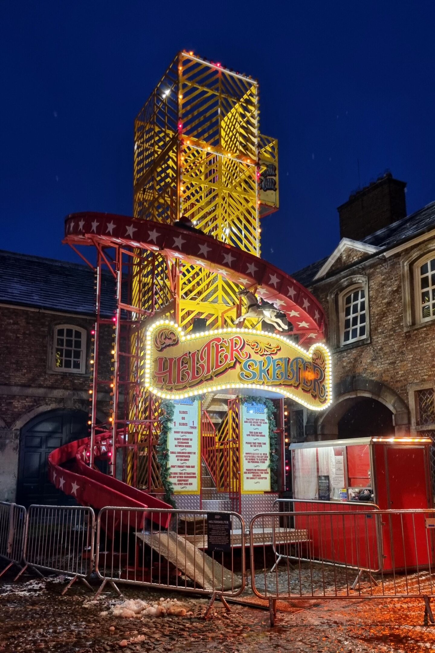 Fairground rides at the start of the Christmas at Dunham Massey light trail