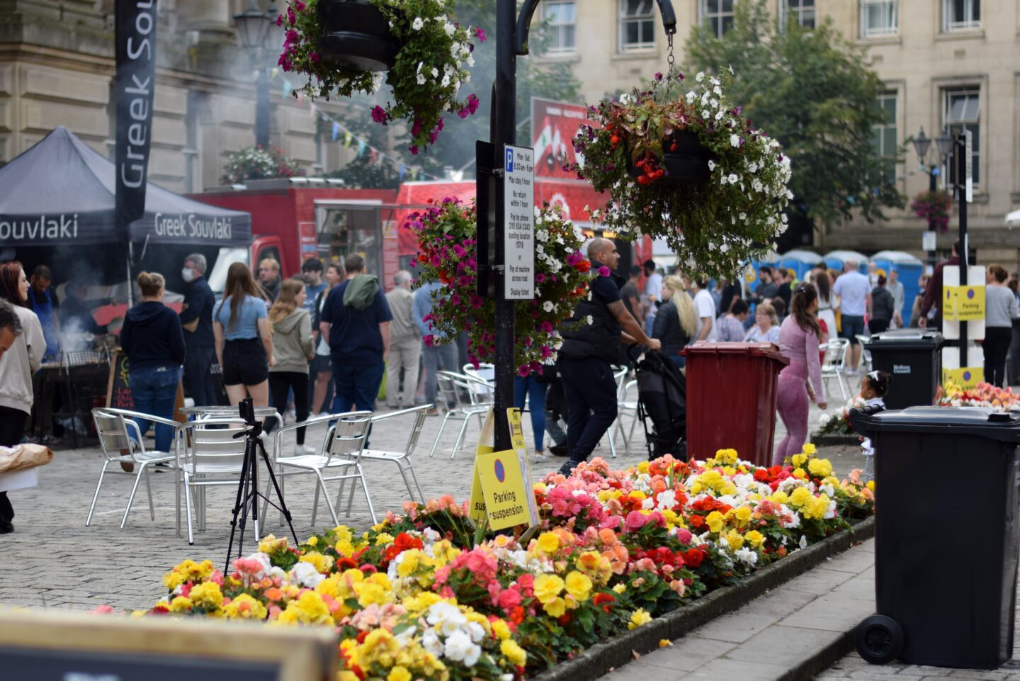 Bolton Food Festival - flower bed with food stalls in the background