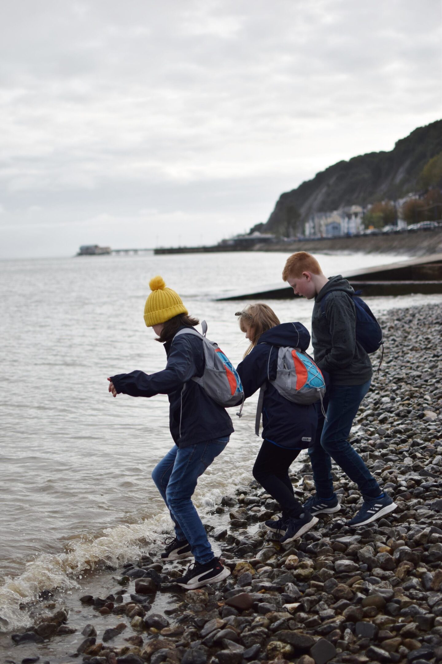 Risking getting wet feet in the sea on Mumbles beach!