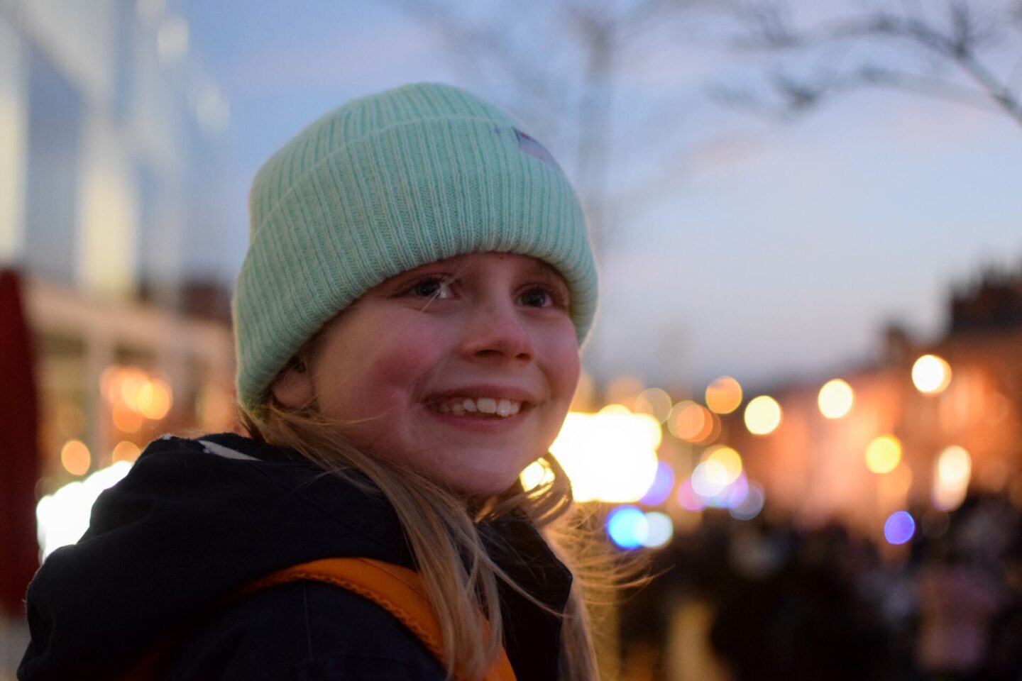 Amy watching the light parade in Oldham