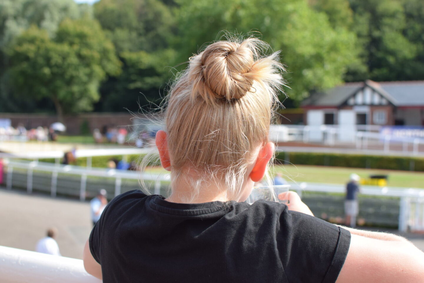 Watching horses in the parade ring