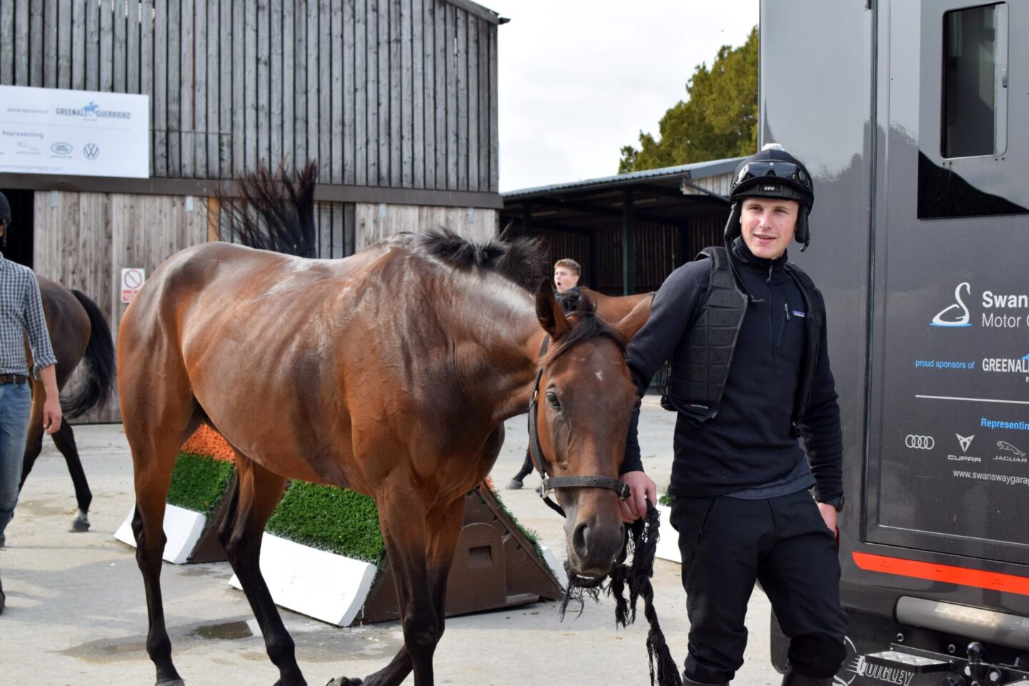 Greenall Guerriero Racing horse training with jockey Fergus