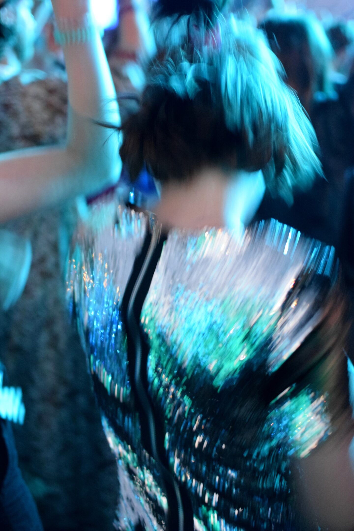 Blurred photo of Chloe dancing in her sequin dress