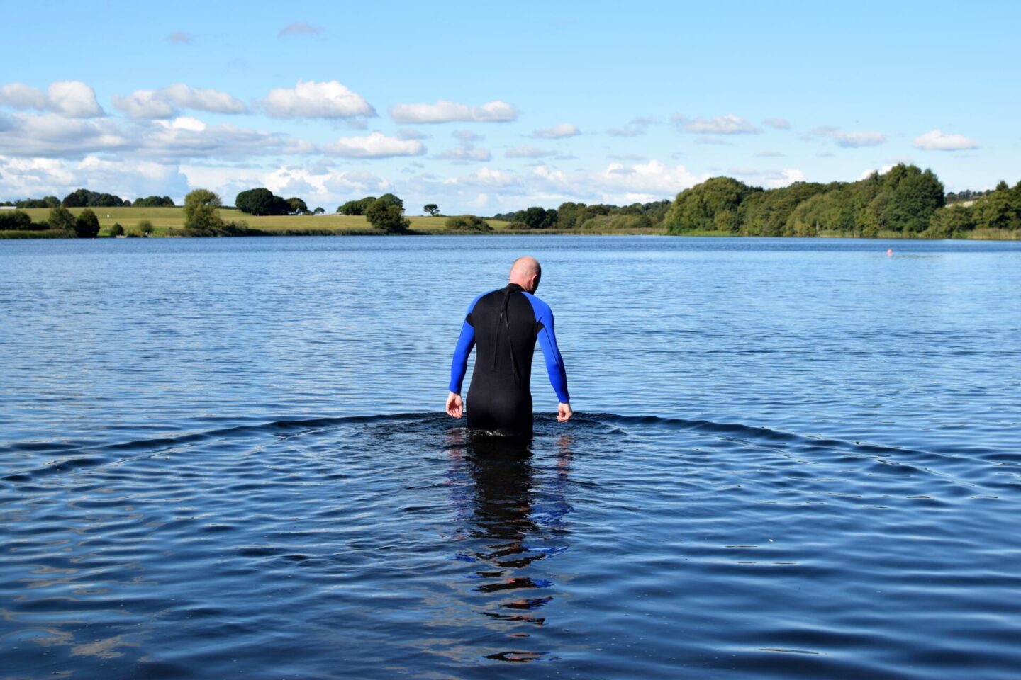 Wading out into Pickmere Lake to acclimatise