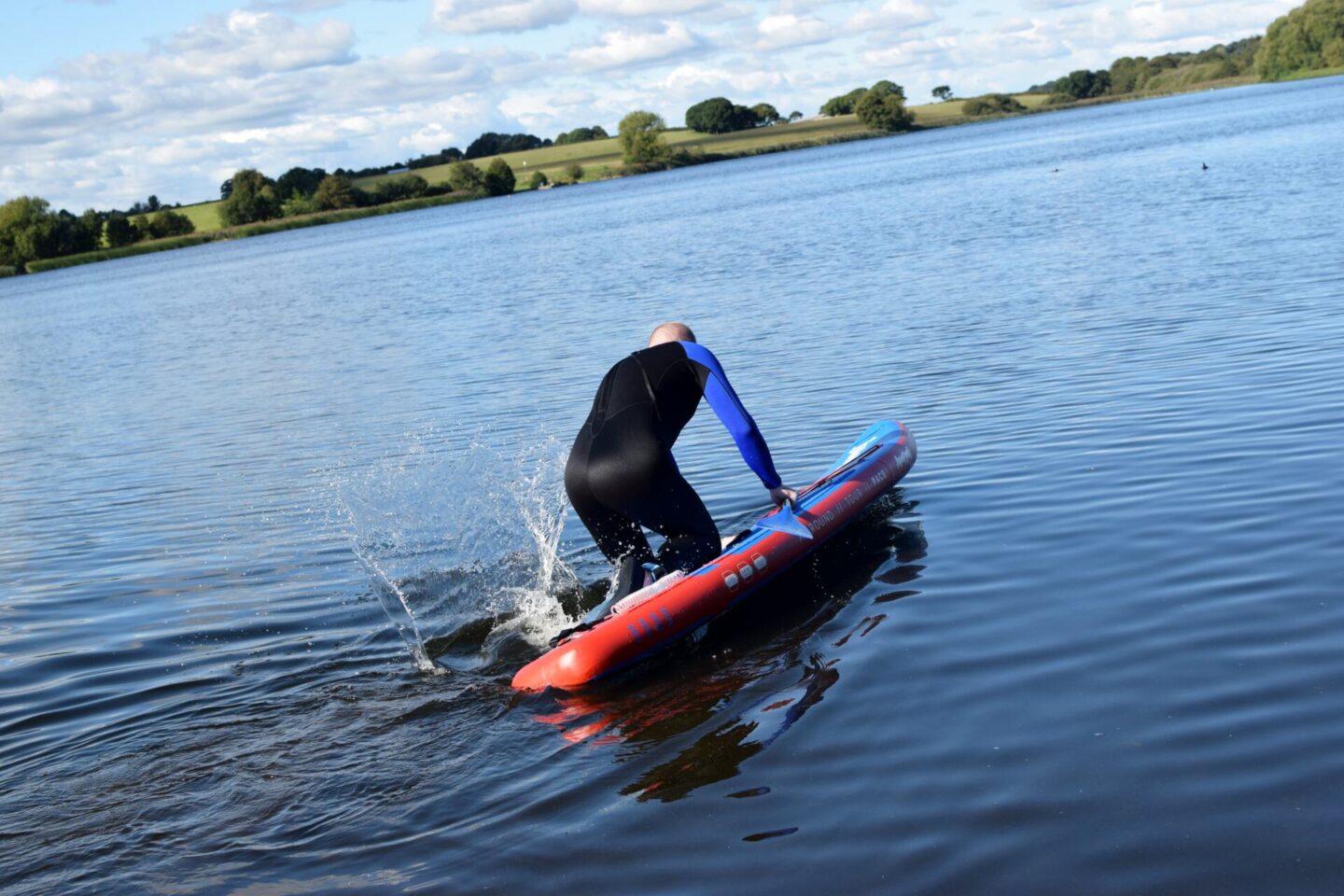 Dave trying to get on the paddle board for the first time