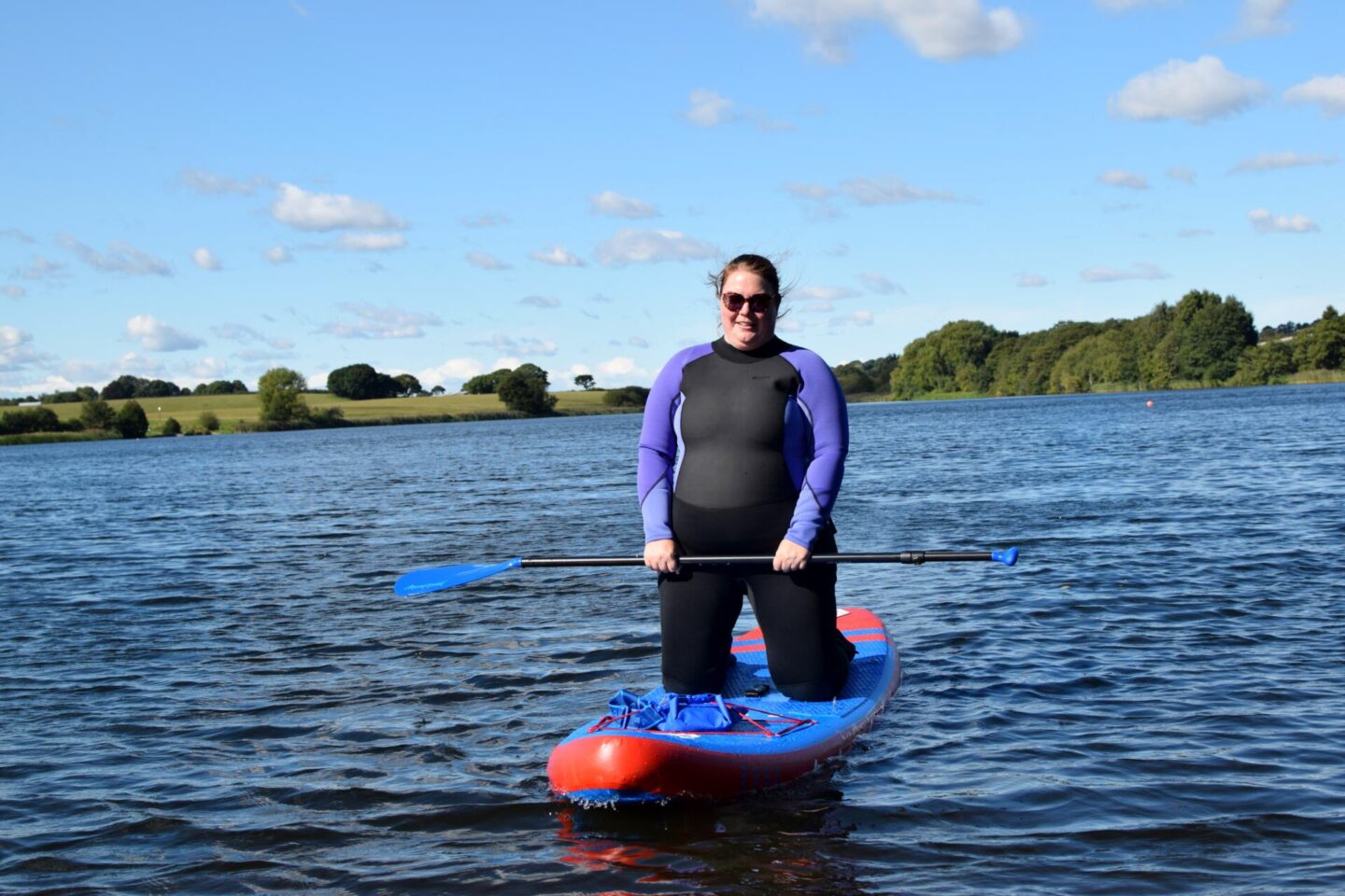 Paddleboarding novice - learning to kneel up on the SUP
