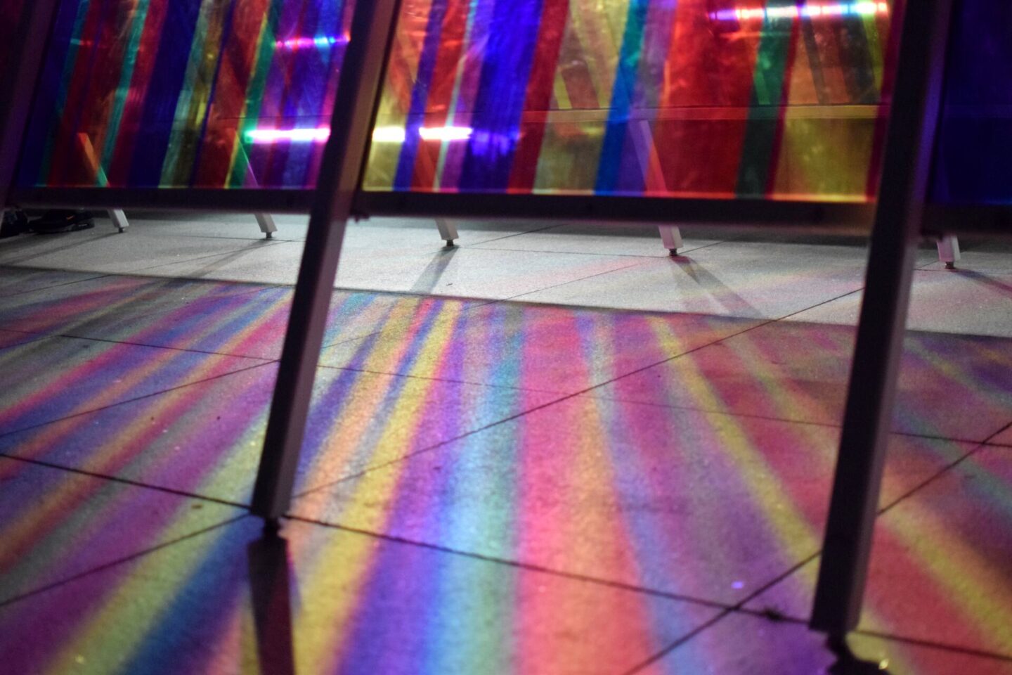 Through No 4 throwing beautiful rainbow lights on the floor by the river.