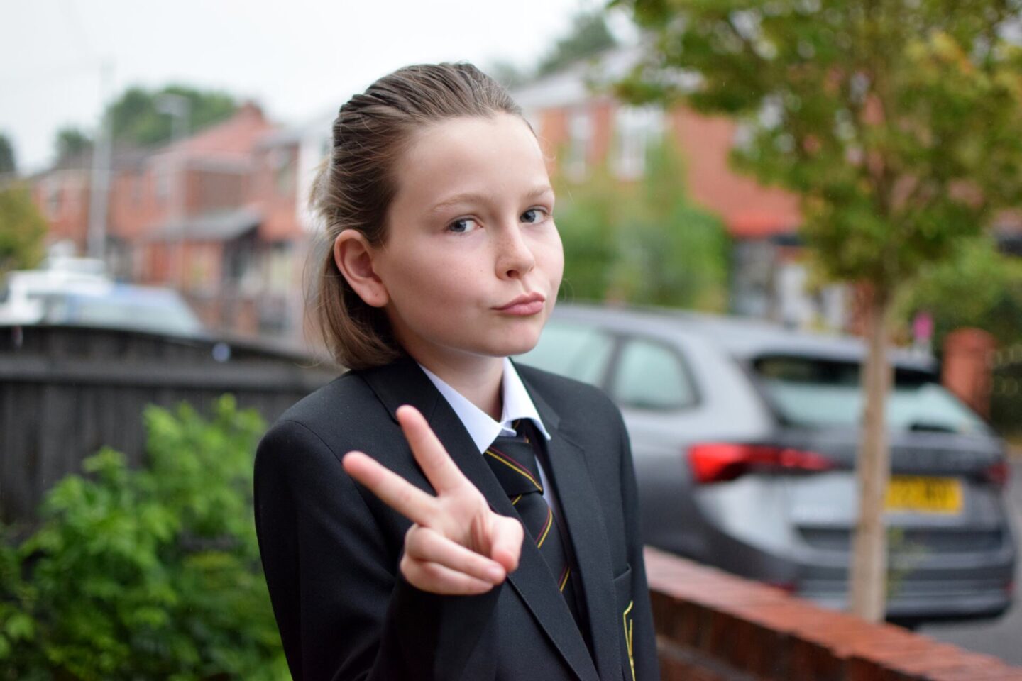 Chloe in her uniform on her first day of secondary school - five months later she is now changing secondary schools