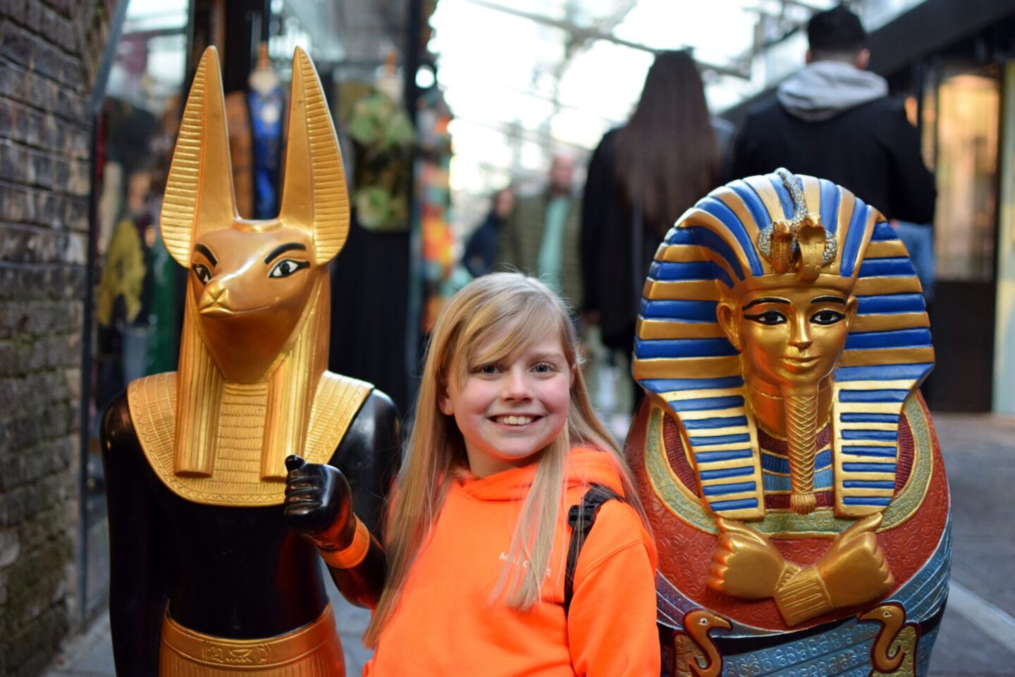 Amy posing with Egyptian statues at Camden Market