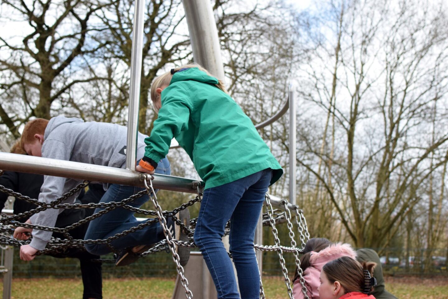 The climbing frame up to the big side is a metal net - which handily means that little ones can't accidentally get themselves up to a slide they are too small for.