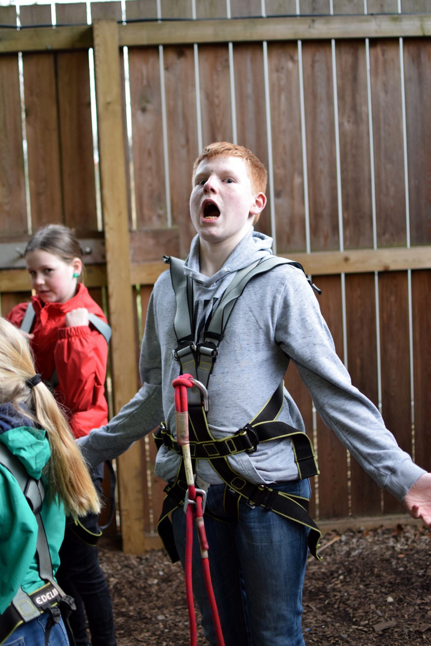 Ben pulls a silly face at the camera whilst wearing a TreeTop Trek harness
