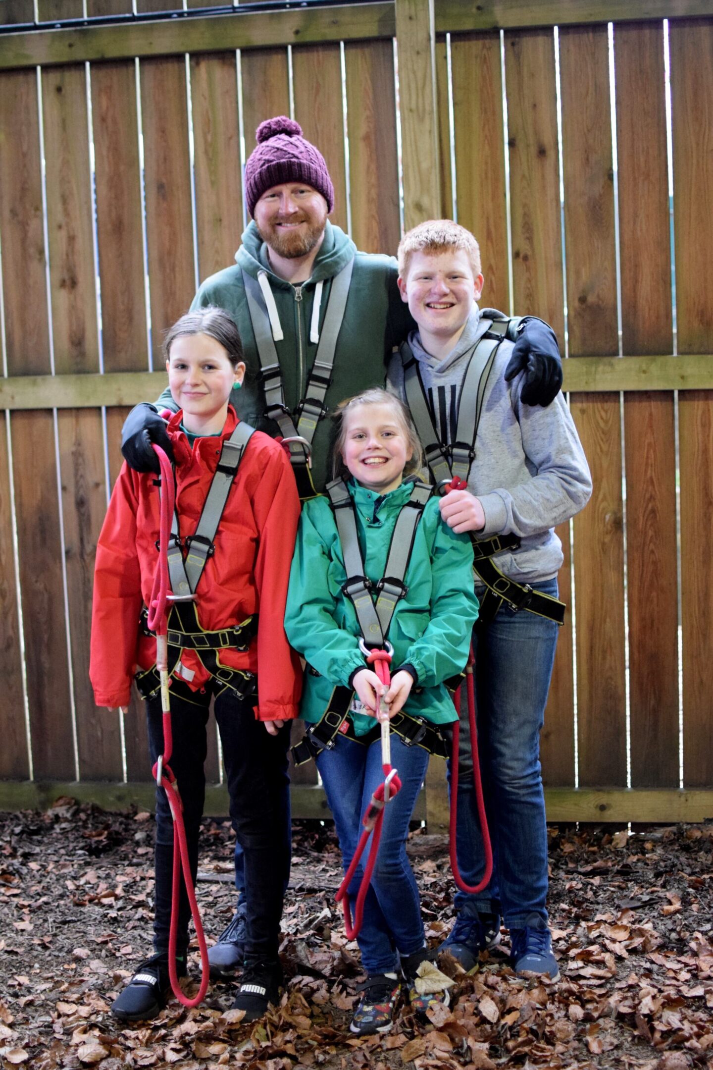 All harnessed up and ready for their TreeTop Trek adventure - under 12s must be accompanied on the trek by an adult