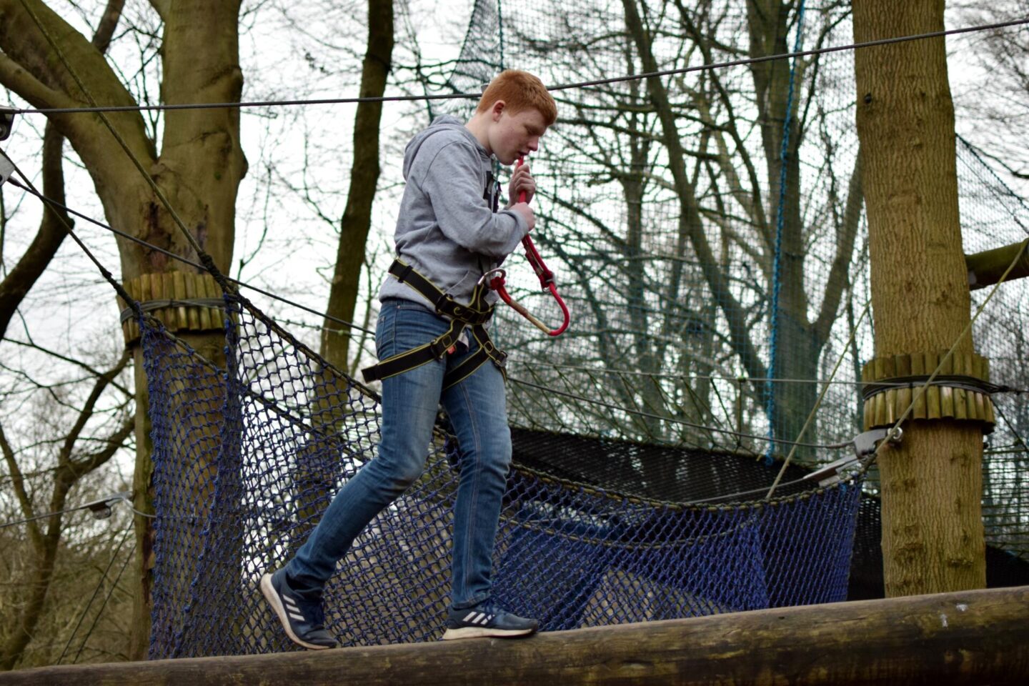 Ben confidently tackles the TreeTop Trek obstacles