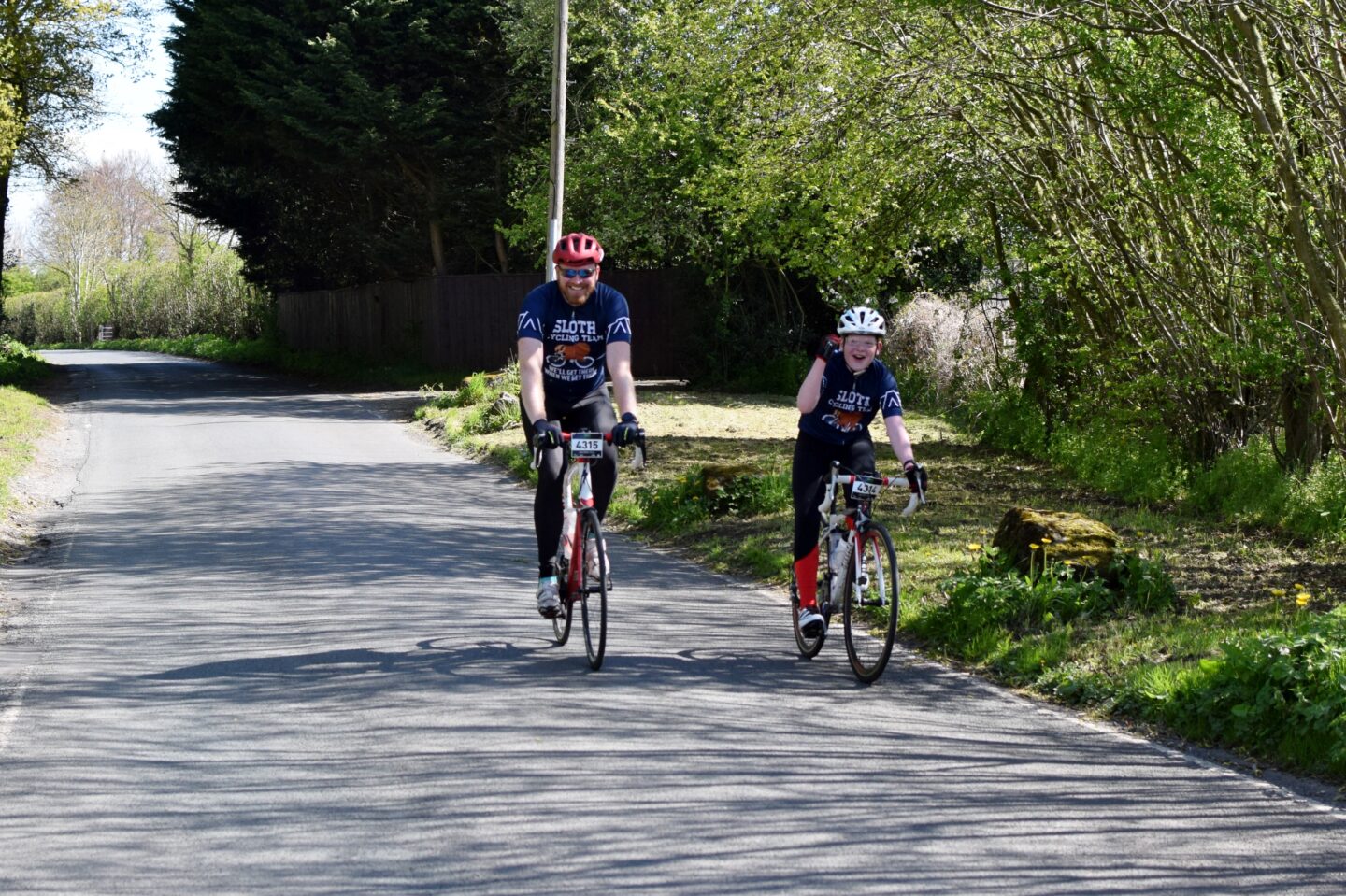 Dave and Ben in matching sloth cycling gear