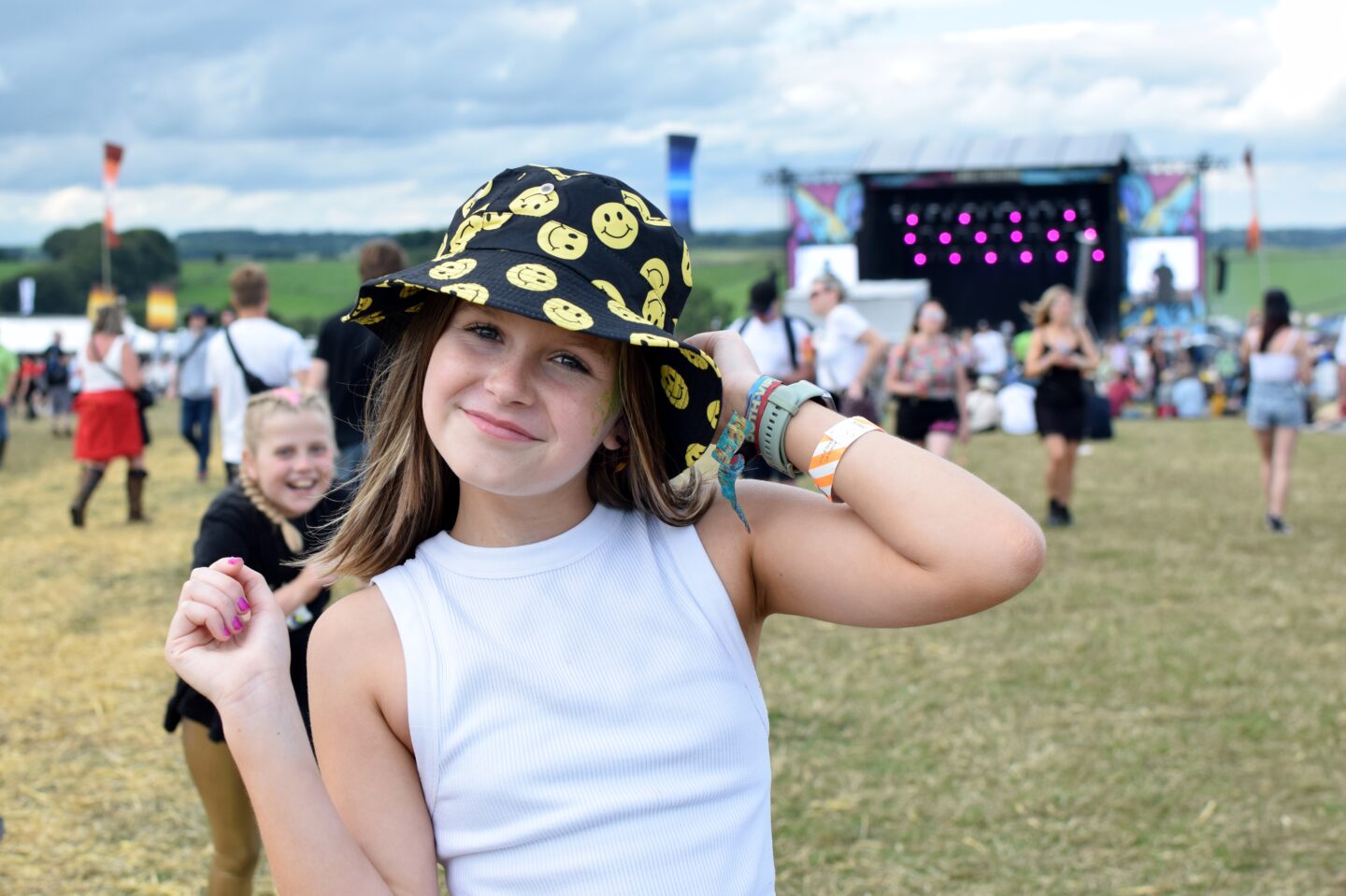 Chloe wearing a smiley bucket hat at Y Not Festival 2023