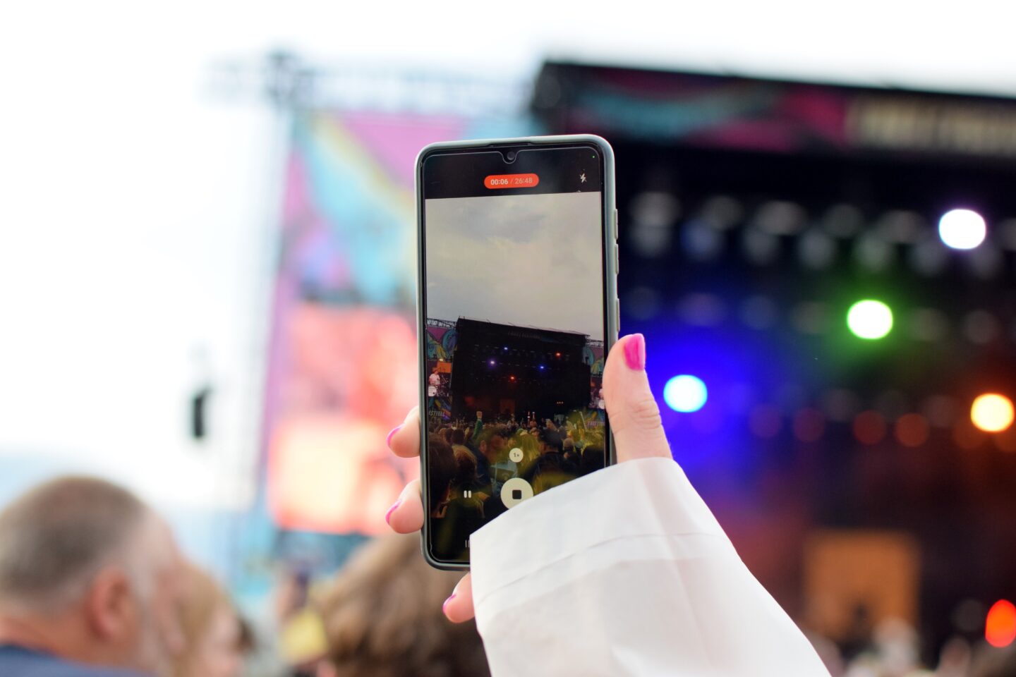 Use a portable charger to keep your phone charged at a festival