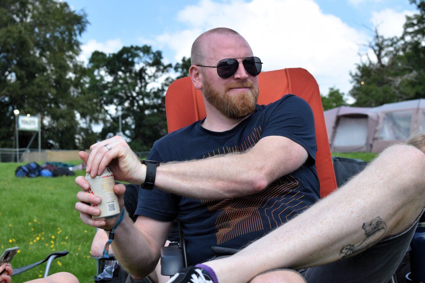 Dave opening his first beer after setting up camp at Camp Bestival Shropshire 2023