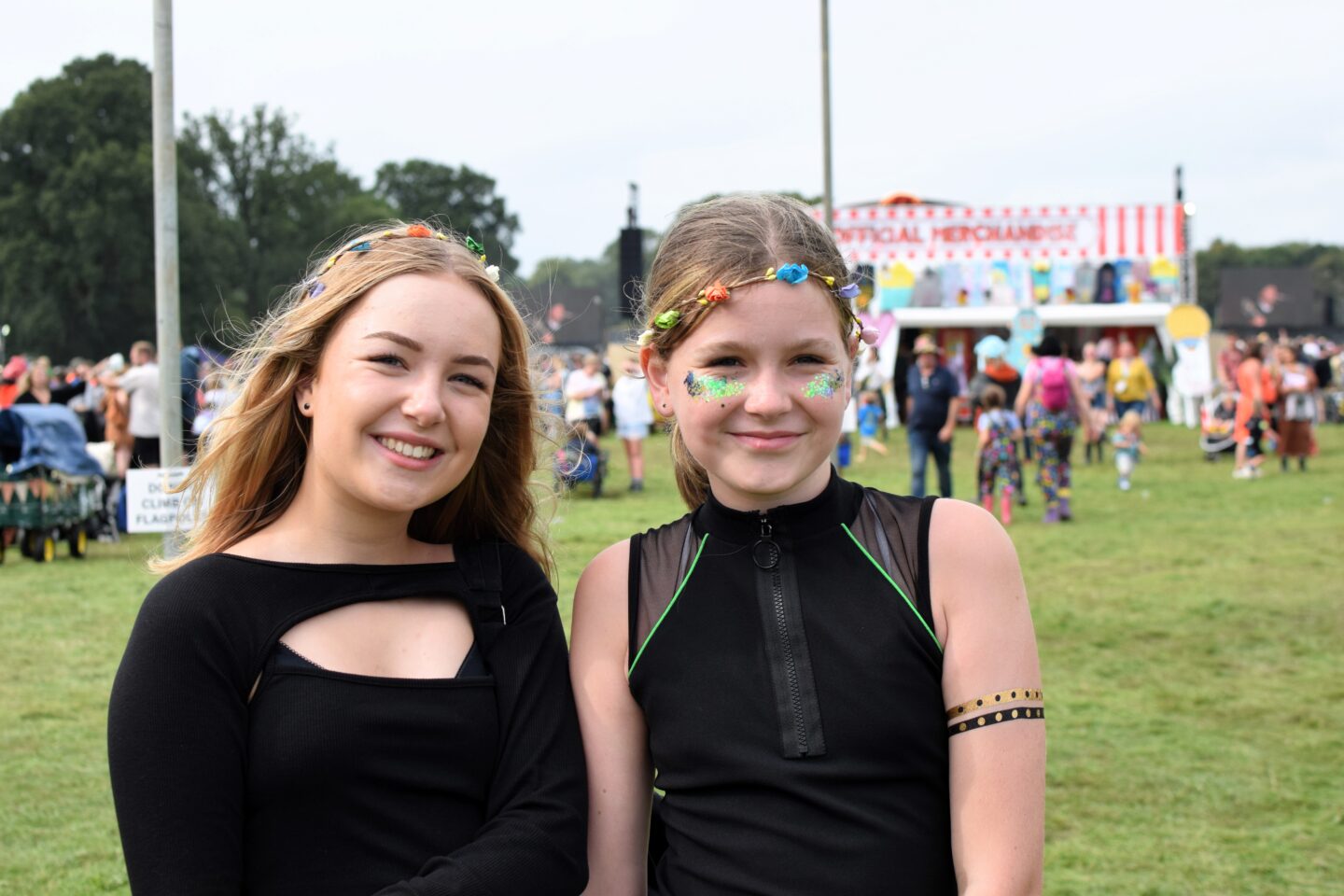 Daisy and Chloe in their festival headbands and glitter