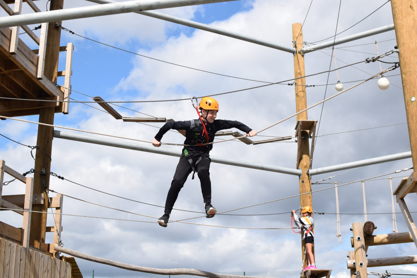 Mission Out High Ropes - teenage boy tackles the high ropes