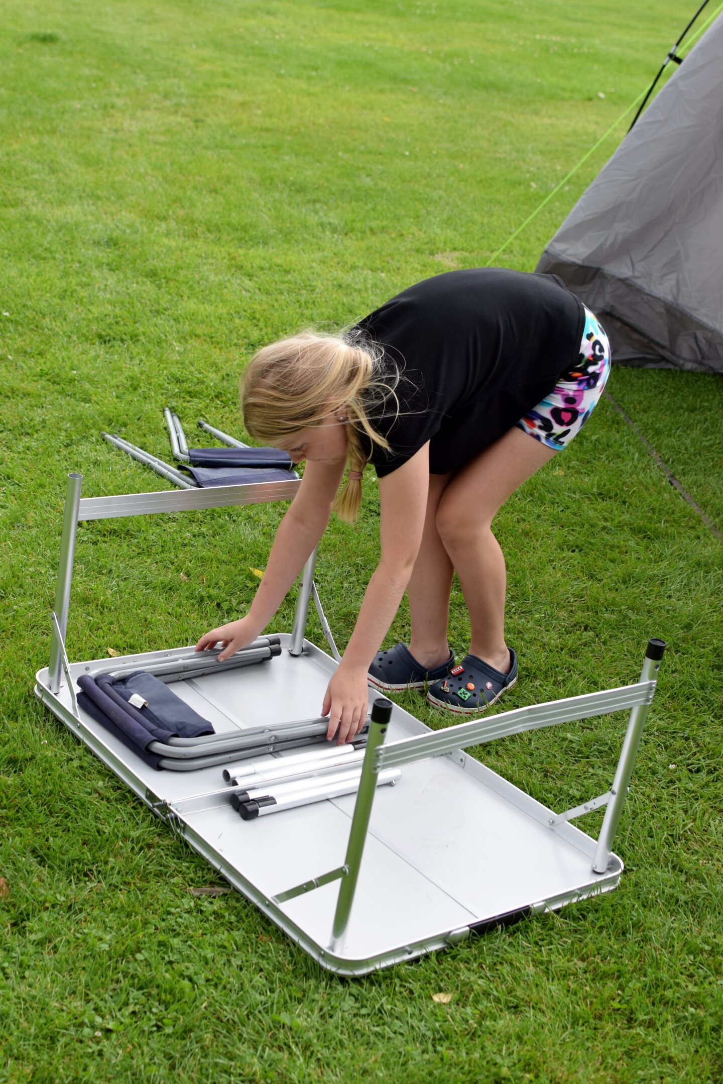 Setting up the camping table is a job kids can do