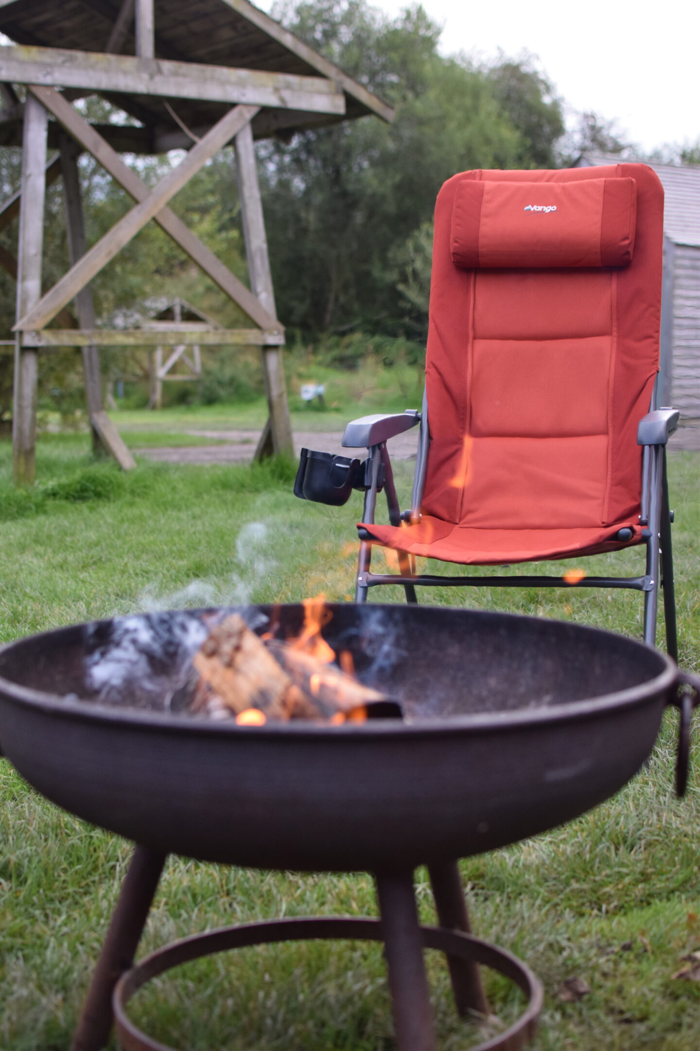 Camp fire with camping chair