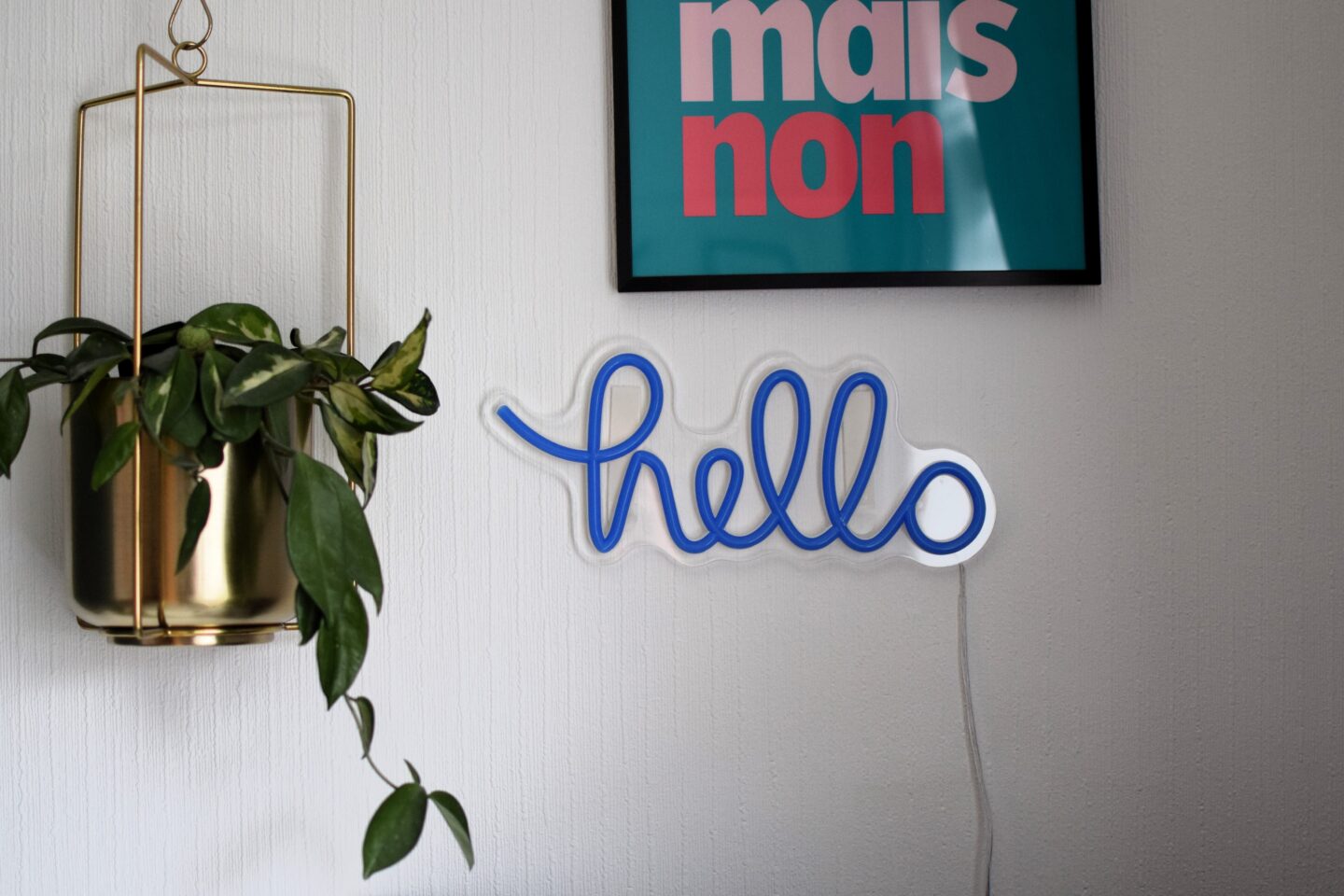 Neon Hello sign on the wall