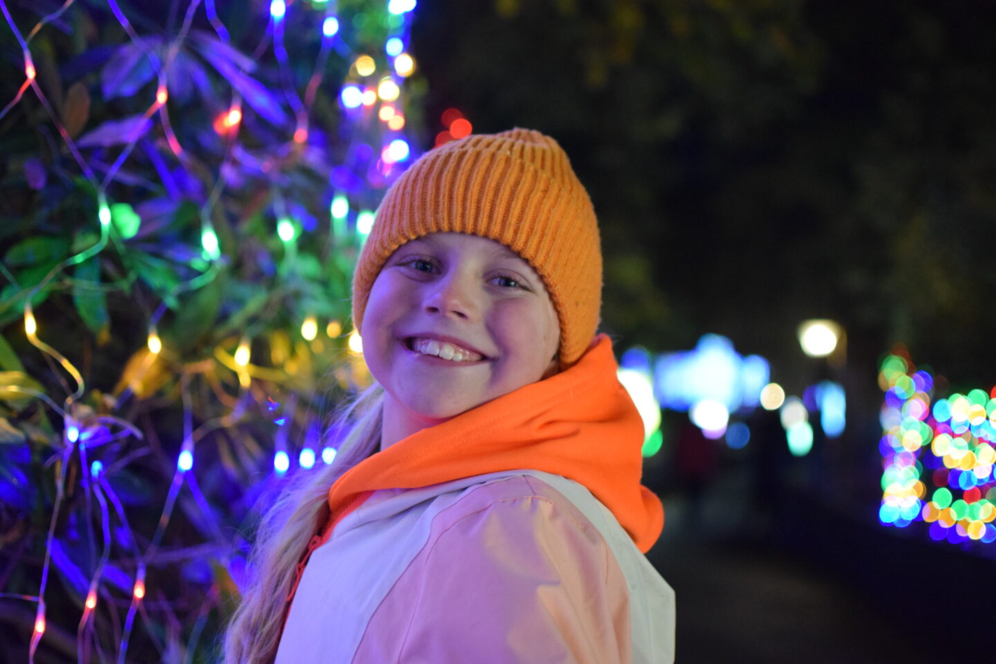 Land of Lights - Warrington - Amy in front of some twinkly hedge lights